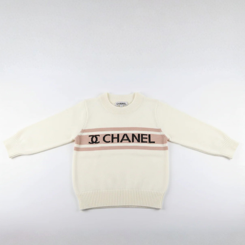 Cream Chanel sweater