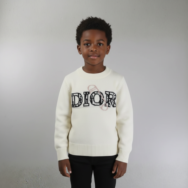 White sweater with 'Dior' logo on a gray background